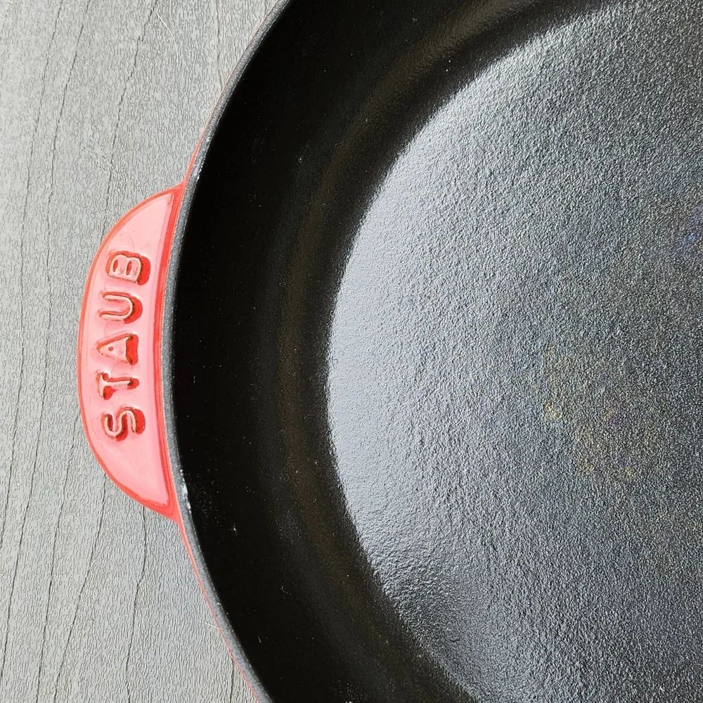 Used once Staub classic cast iron fry pan in cherry red